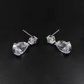 Silver drop earrings with clear faceted teardrop crystals in metal frame for silver bride headdress crown necklace jewelry suit