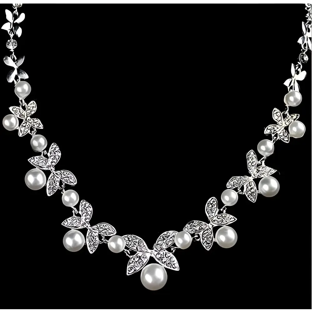 Silver butterfly bride necklace and earrings set with pearls and crystal embellishments for bride wedding jewelry