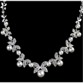 Silver butterfly bride necklace featuring silver leaf and pearl with intricate filigree detailing for bride wedding jewelry