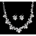 Silver butterfly bride necklace and earrings set with pearls and crystal embellishments for bride wedding jewelry