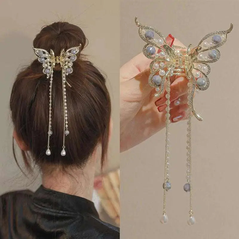 Gold-toned butterfly grab clip with temperament bow tassel adorned with sparkling crystals and lavender pearls