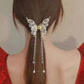 Silver butterfly temperament bow tassel grab clip with rhinestones and pearl chain bow tassel accessory details
