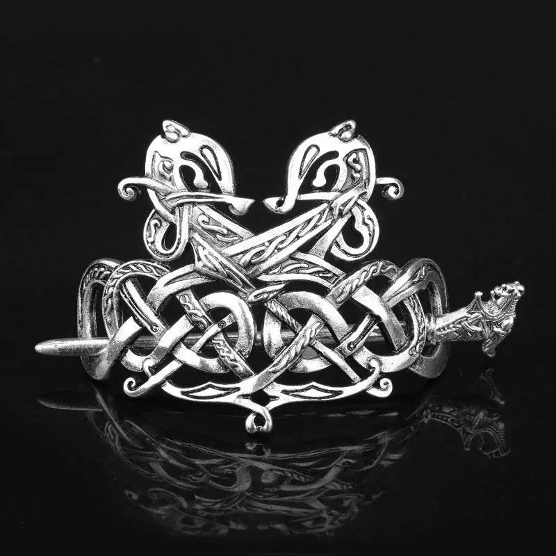Silver Celtic knot metal hair clip with intricate Viking-style dragon motifs in a retro hair clip design