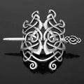 Silver celtic knot metal hair clip with intricate interwoven designs and ornate decorative head for retro styling