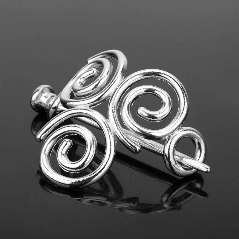 Silver celtic knot metal hair clip featuring a silver spiral pin with intricate coiled wire design for retro style