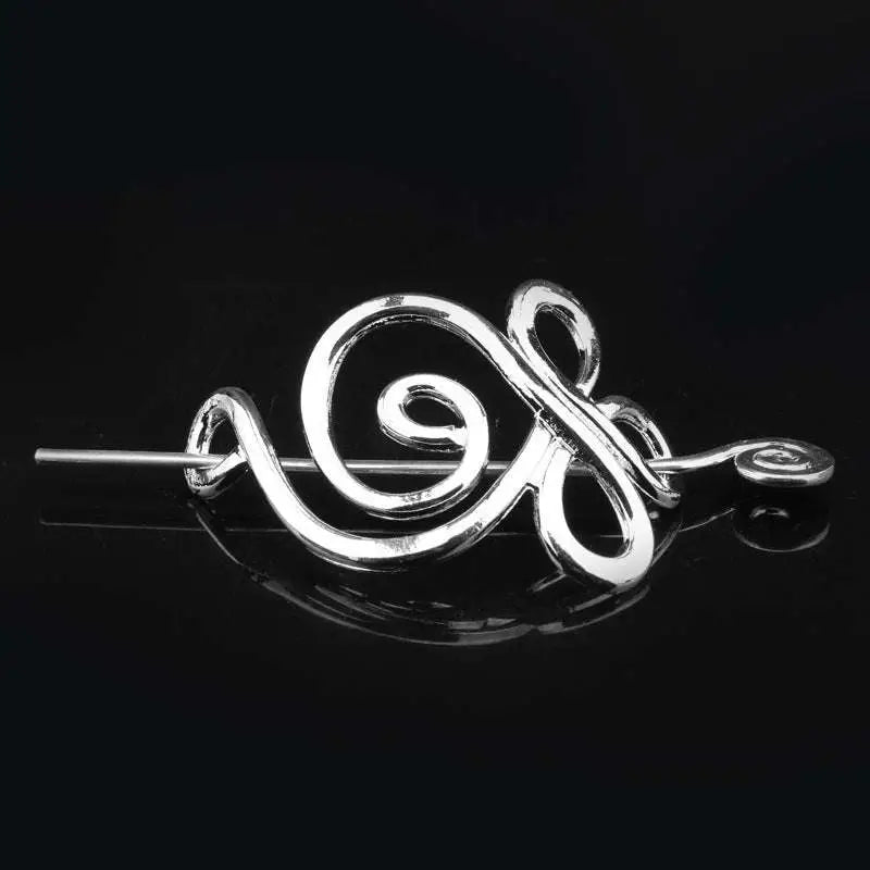 Silver celtic knot metal hair clip featuring a silver spiral hairpin with a sleek twisted design and polished finish