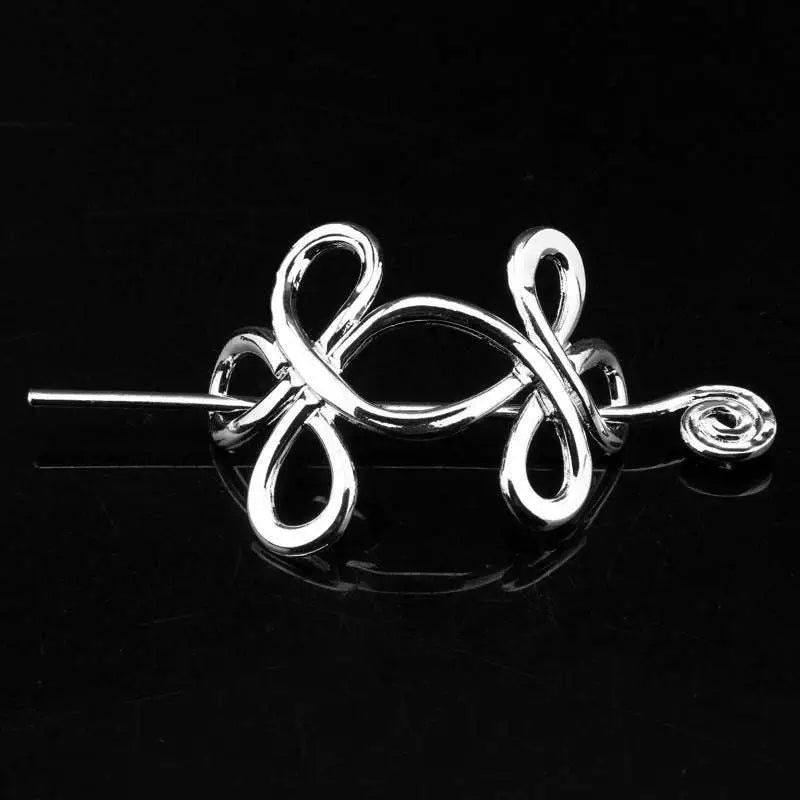 Silver celtic knot metal hair clip featuring an intricate flowing knot design in a silver wire hairpin style