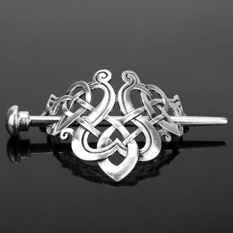 Silver celtic knot metal hair clip with intricate interwoven design and polished finish ideal for hair clip retro style