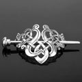 Silver celtic knot metal hair clip with intricate interwoven design and polished finish ideal for hair clip retro style