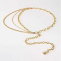Gold-toned layered chain belt with three link styles and padlock clasp for summer body jewelry and jewelry hip hop