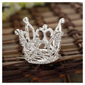 A silver childrens hair comb crown adorned with intricate design and sparkling clear rhinestone crown rhinestone accessories