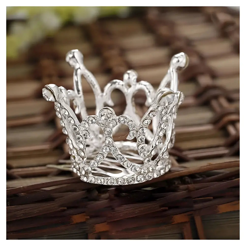 A silver childrens hair comb crown adorned with intricate design and sparkling clear rhinestone crown rhinestone accessories