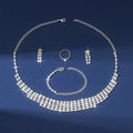 Sparkling silver claw chain necklace with geometric rhinestone lattice design included in bracelet earrings ring set
