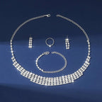 Sparkling silver claw chain necklace with geometric rhinestone lattice design included in bracelet earrings ring set