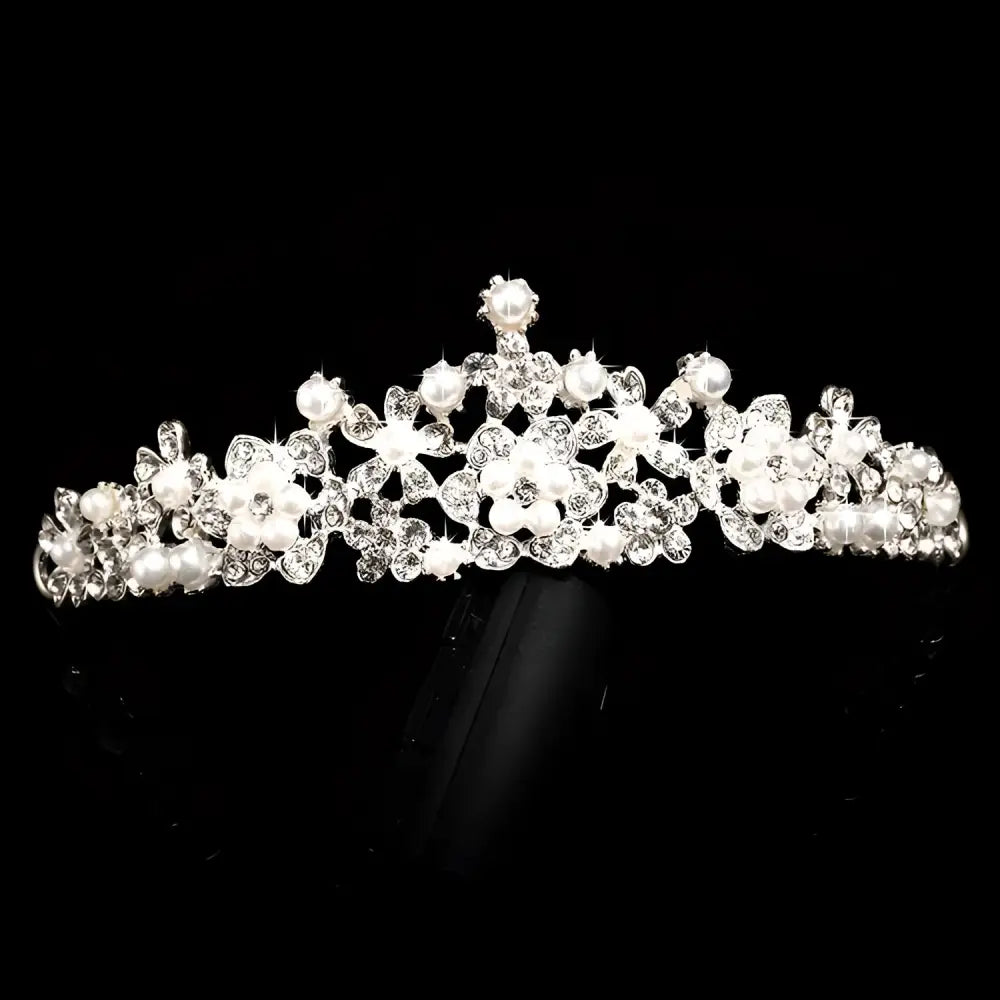 Silver crystal alloy headdress bridal crown adorned with intricate floral designs clear crystals and white pearls