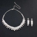 Silver crystal choker wedding jewelry set with cascading crystal design and matching silver rhinestone drop earrings