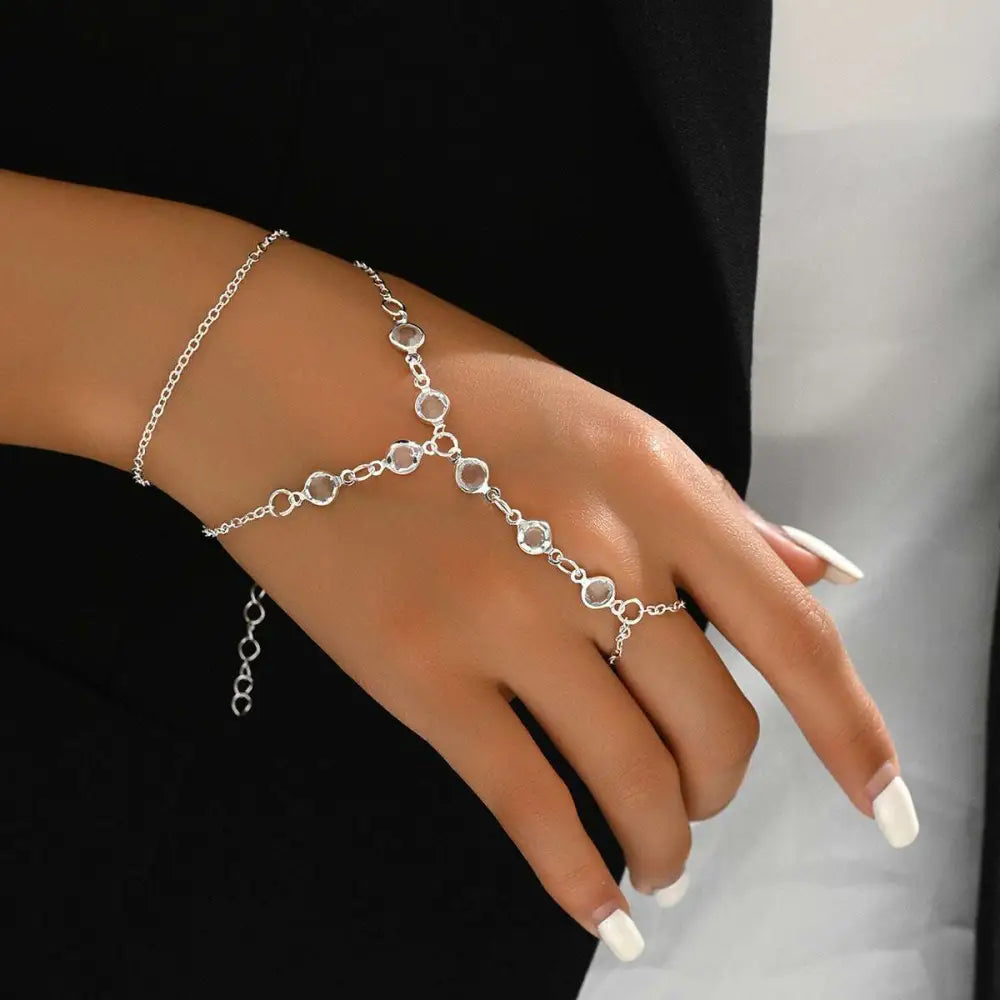 Silver crystal fashion minimalist bracelet ring featuring a silver chain with clear faceted gemstones in a y-shaped design