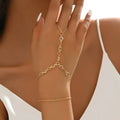 Gold-toned minimalist bracelet ring with clear oval gemstones and delicate linked chains for silver crystal fashion