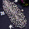 Silver crystal leaf styling hair accessory with iridescent crystals and delicate silver metal base for elegant styling hair