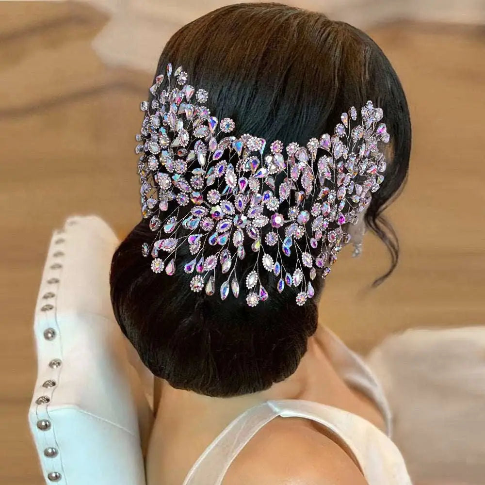 Silver crystal leaf elegant styling hair accessory featuring a sparkling iridescent pink and silver leafy design