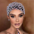 A silver crystal leaf styling hair accessory with sparkling teardrop stones and an intricate elegant design