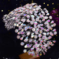 A silver crystal leaf styling hair accessory with pear-shaped and round stones in a delicate silver framework