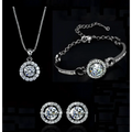 Silver diamond jewelry set featuring a silver-toned necklace bracelet and earrings with central diamonds and pave stones