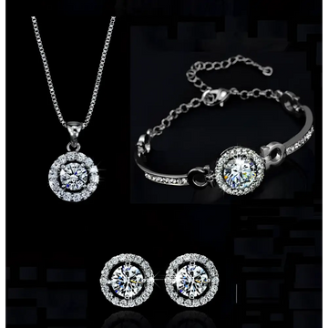 Silver diamond jewelry set featuring a silver-toned necklace bracelet and earrings with central diamonds and pave stones