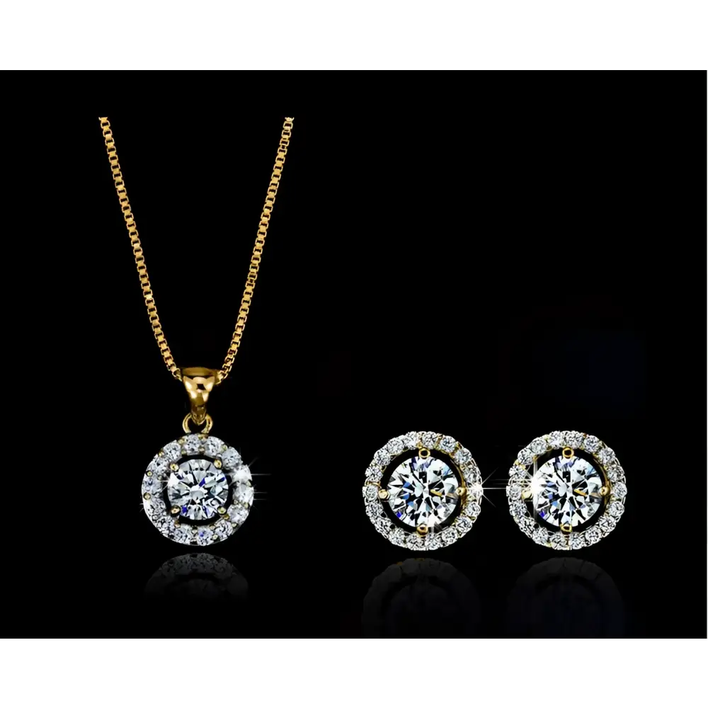 Silver diamond jewelry set featuring a silver-toned necklace bracelet and earrings with central diamonds and pave stones