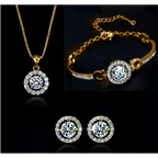 Gold-toned silver diamond jewelry set with necklace bracelet and earrings featuring circular halo clear stones