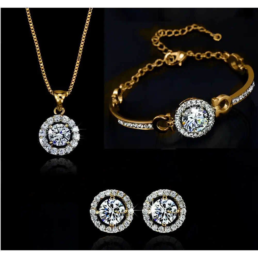 Gold-toned silver diamond jewelry set with necklace bracelet and earrings featuring circular halo clear stones