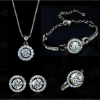 Silver diamond jewelry sets featuring a silver necklace, bracelet, earrings, and ring with sparkling circular halo stones