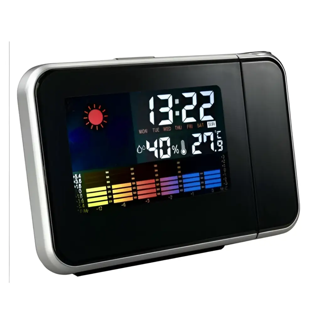 Silver digital weather station home electronic clock with black digital display silver trim showing time temperature humidity and forecast