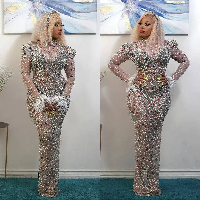 Silver feathered rhinestone mesh stretch slim dress with shimmering silver beads and delicate feather cuffs