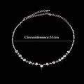 Silver floral bridal two piece necklace and earrings set featuring a delicate silver chain with sparkling crystal flowers