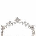 A delicate silver floral crystal zircon hair band adorned with sparkling crystal flowers and leaves with pearls