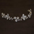 Delicate silver floral crystal zircon hair band adorned with clear crystals and pearls in intricate vine patterns