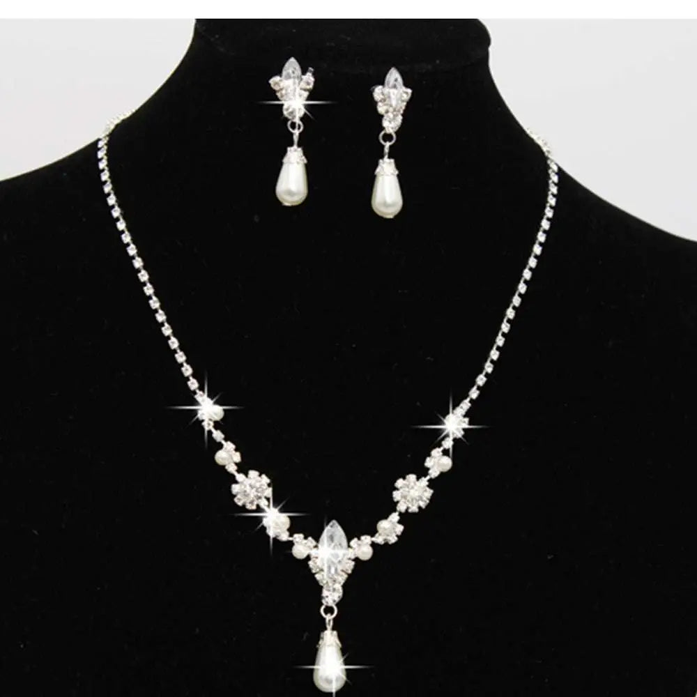 Silver floral personality dropspearl necklace set featuring silver crystal and pearl with floral designs and teardrop pendants