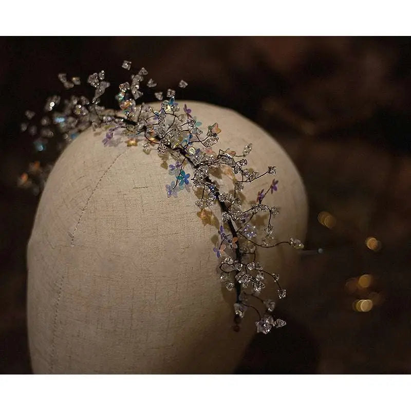 Delicate silver floral super fairy dream crystal hair hoop with sparkling clear crystals and pastel floral embellishments