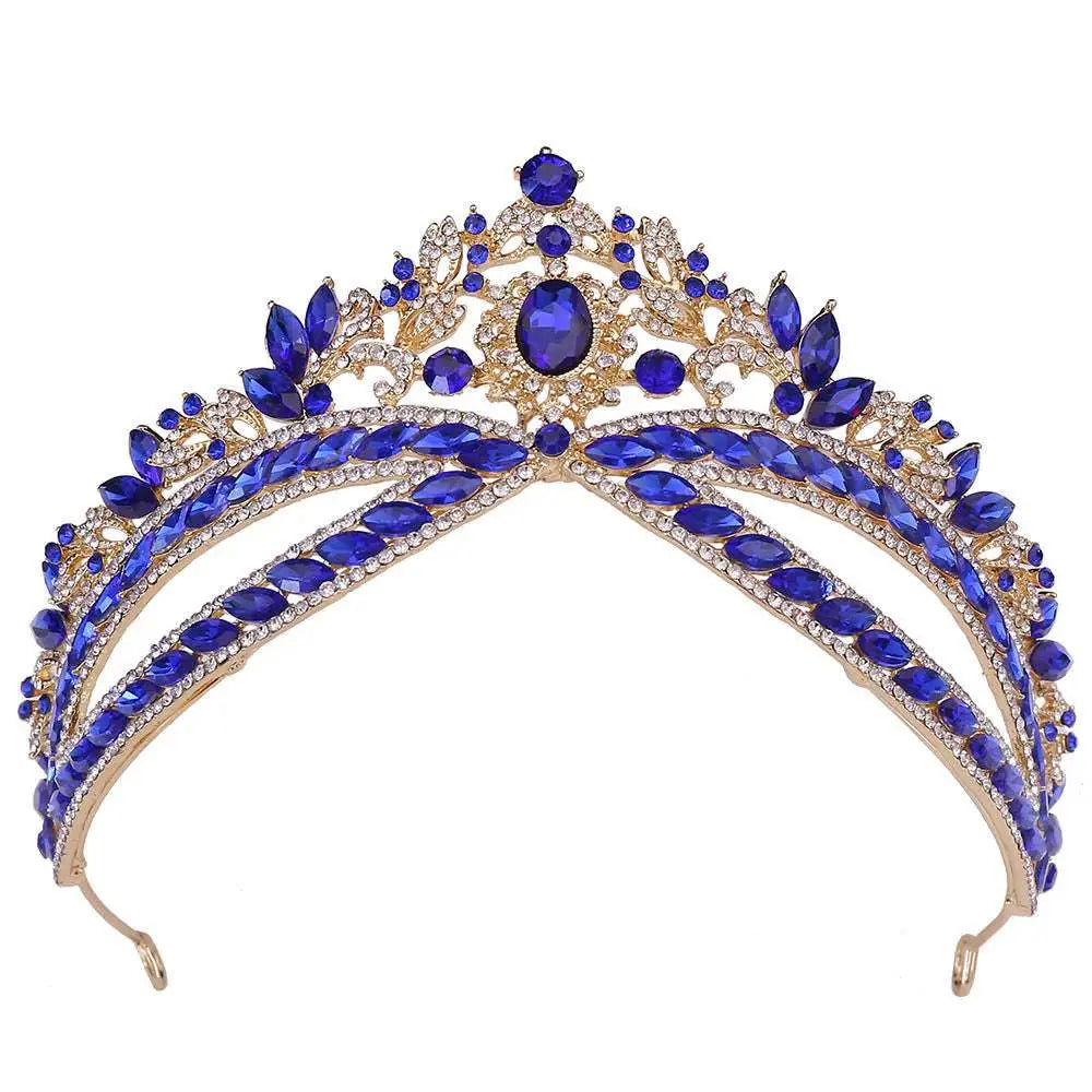 Silver floral wedding crown headdress with oval crystal featuring royal blue and gold tiara with sapphires and leaf motifs