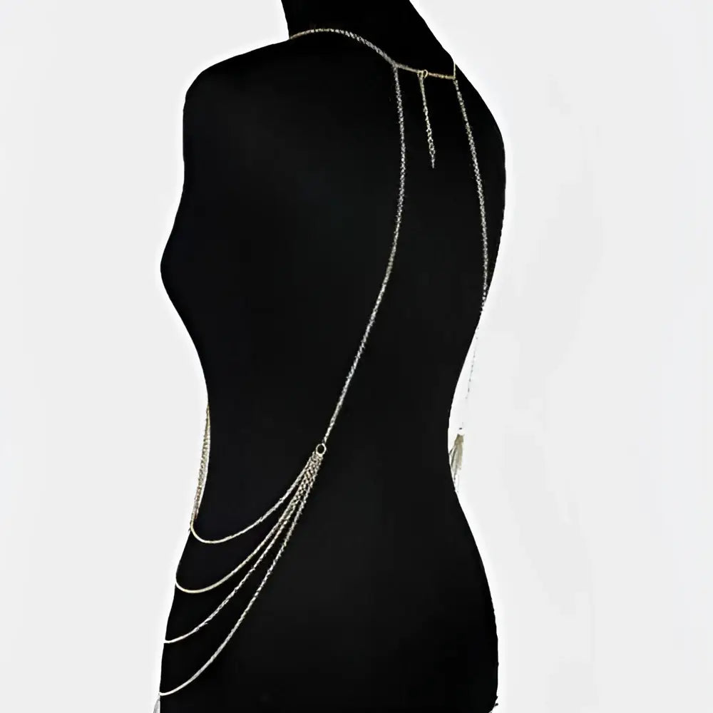 Silver graduated pearl body chain jewelry featuring a silver chain with layered strands and dangling tassels