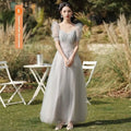 Silver gray tulle beaded sisters dress female with puffy sleeves and square collar featuring subtle glitter embellishments
