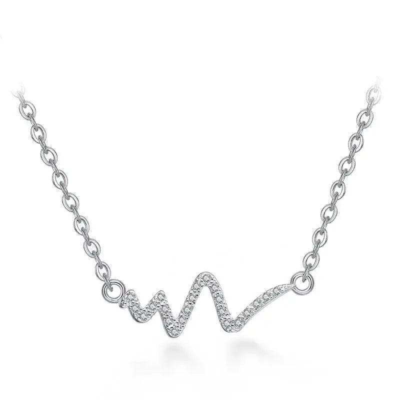 Silver heartbeat korean necklace with delicate wave-shaped pendant adorned with sparkling clear stones