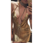 Silver ladies sequined party dress in shimmering gold with deep plunging neckline and draped front detail