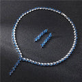 A sparkling blue and silver leaf cubic zirconia necklace with matching bride wedding earrings jewelry set