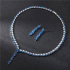 A sparkling blue and silver leaf cubic zirconia necklace with matching bride wedding earrings jewelry set