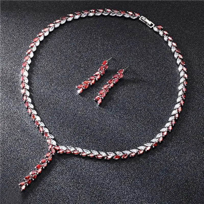Elegant red and clear marquise-cut gemstone necklace with silver leaf cubic zirconia metalwork for bride wedding earrings set