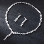 Silver leaf cubic zirconia wedding earrings jewelry set featuring a silver leaf-patterned necklace and sparkling clear crystals
