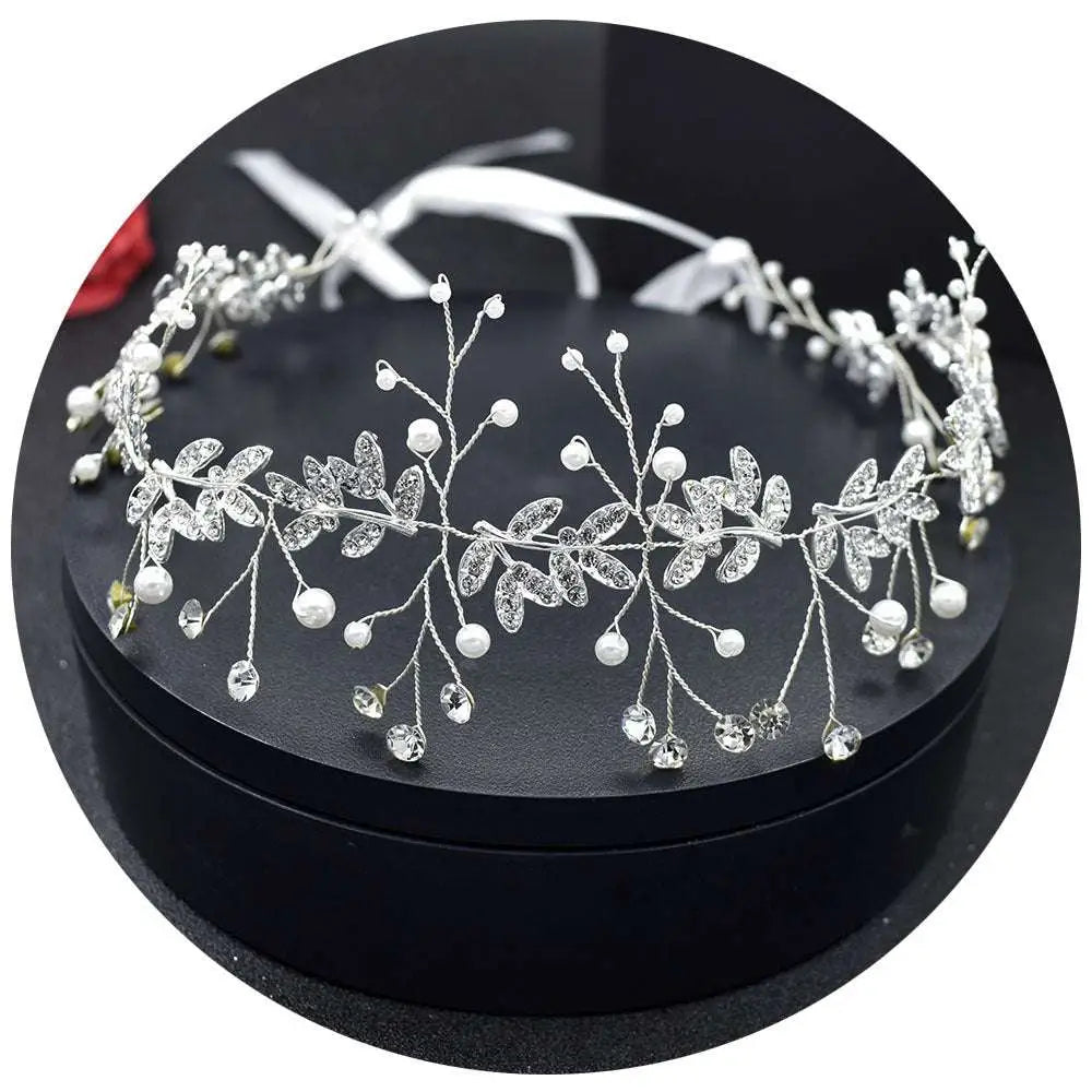 Silver leaf pearl bridal hair band adorned with silver rhinestone alloy crystals and delicate pearls