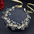 Gold-toned bridal hair band with silver leaf pearl and rhinestone alloy accented vine design for elegant occasions
